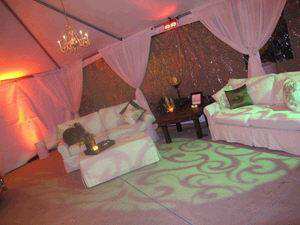 Tenting Inspiration with Swagged Fabric Around Poles from Ventura Rental Party Center